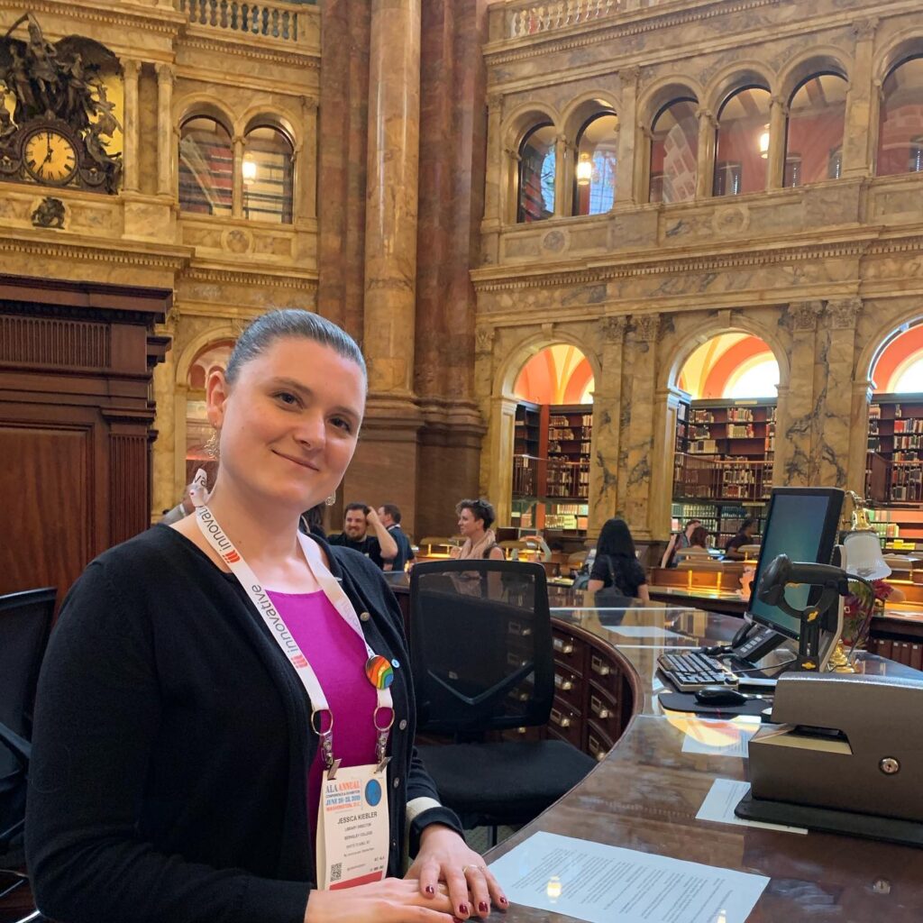 Headshot of Jessica Kiebler inside the Library of Congress in the background